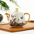 Porcelanowy dzbanek do herbaty 450 ml ze złotym wykończeniem