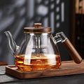 Szklany dzbanek do herbaty 900 ml z drewnianą rączką