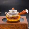 Szklany dzbanek do herbaty z drewnianą rączką 300 ml