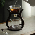 Szklany dzbanek do herbaty z drewnianym uchwytem 300 ml